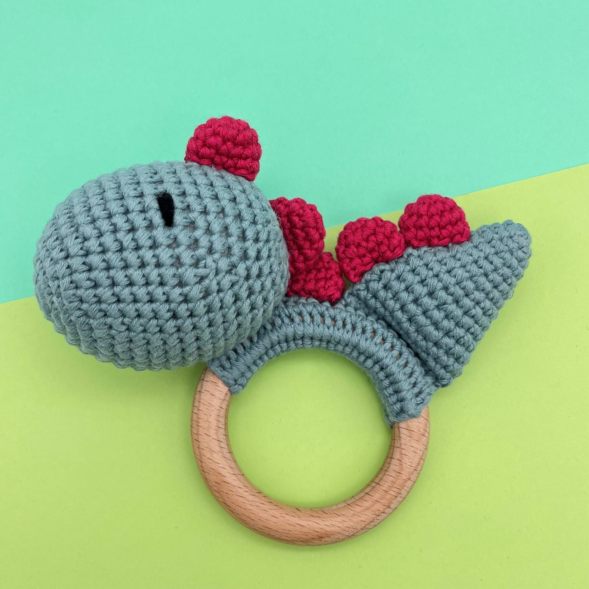 Baby rattle dino with teething ring - turquoise